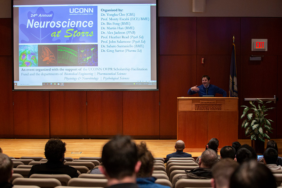 A researcher presents their work at the Neuroscience at Storrs event. 